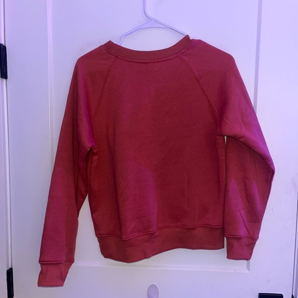 Coral color med unisex crewneck polyester sweater with a swoosh check mark on it - Picture 6 of 7